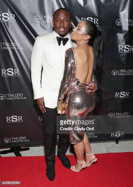 Player LeSean McCoy and designer Delicia Cordon arrive at the Thuzio Executive Club and Rosenhaus Sports Representation Party at Clutch Bar during...