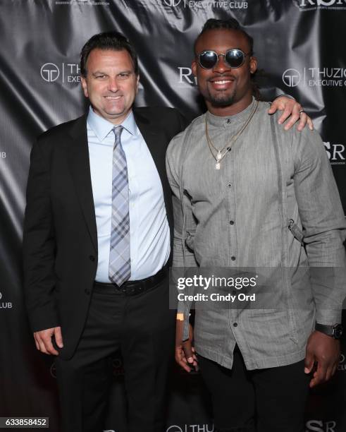 Host Drew Rosenhaus and NFL player Johnathan Cyprien arrive at the Thuzio Executive Club and Rosenhaus Sports Representation Party at Clutch Bar...