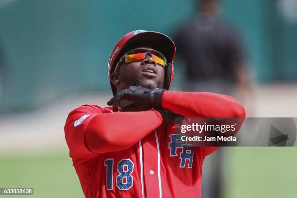 Rusney Castillo of Puerto Rico, celebrates during a game between Tigres de Licey of the Dominican Republic and Criollos de Caguas of Puerto Rico in...