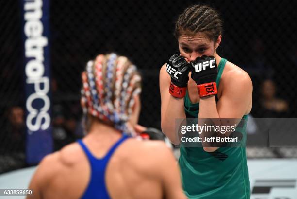 Alexa Grasso of Mexico circles Felice Herrig in their women's strawweight bout during the UFC Fight Night event at the Toyota Center on February 4,...