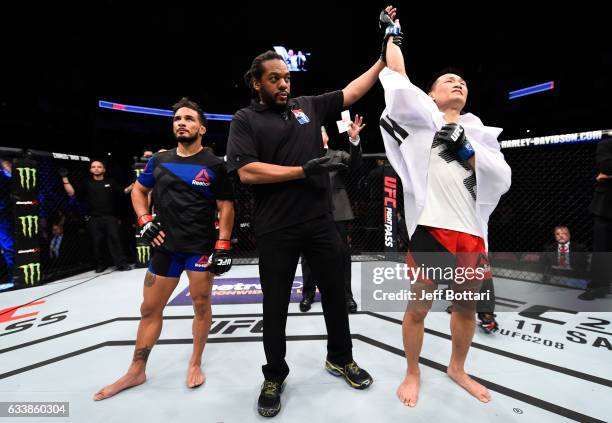 Chan Sung Jung of South Korea celebrates his victory over Dennis Bermudez in their featherweight bout during the UFC Fight Night event at the Toyota...