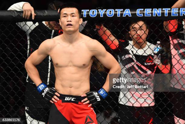 Chan Sung Jung of South Korea enters the Octagon before facing Dennis Bermudez in their featherweight bout during the UFC Fight Night event at the...