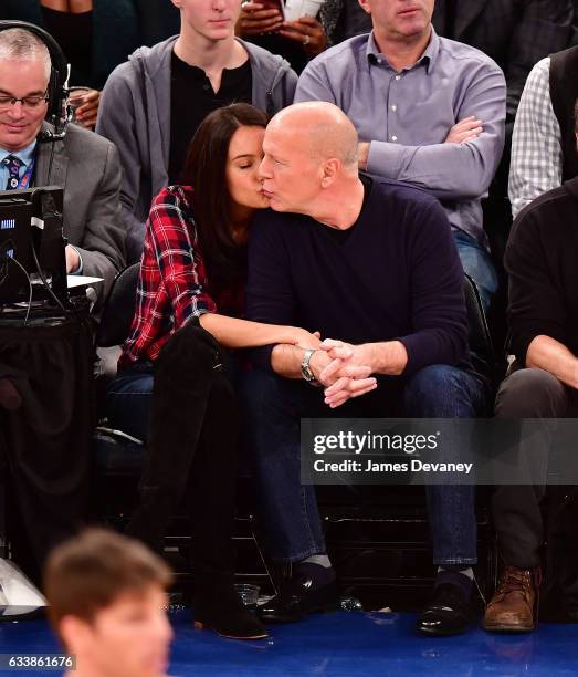 Emma Heming Willis and Bruce Willis attend Cleveland Cavaliers Vs. New York Knicks game at Madison Square Garden on February 4, 2017 in New York City.