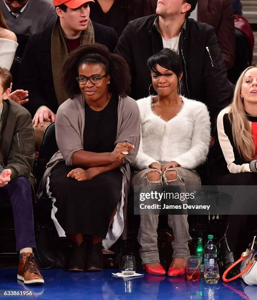 Uzo Aduba and guest attend Cleveland Cavaliers Vs. New York Knicks game at Madison Square Garden on February 4, 2017 in New York City.