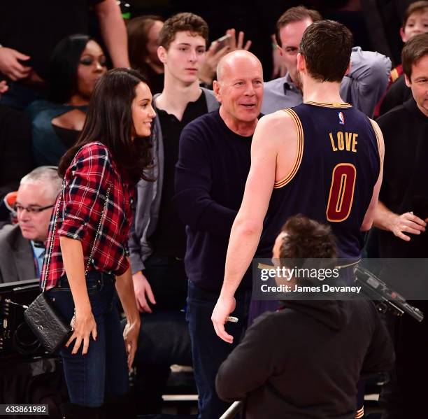 Emma Heming Willis, Bruce Willis and Kevin Love attend Cleveland Cavaliers Vs. New York Knicks game at Madison Square Garden on February 4, 2017 in...