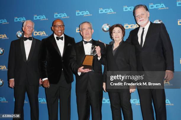 Retiring DGA National Executive Director Jay D. Roth , recipient of the DGA Presidents Award, poses with director Michael Apted, DGA President Paris...