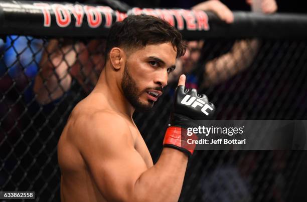 Dennis Bermudez enters the Octagon before facing Chan Sung Jung of South Korea in their featherweight bout during the UFC Fight Night event at the...