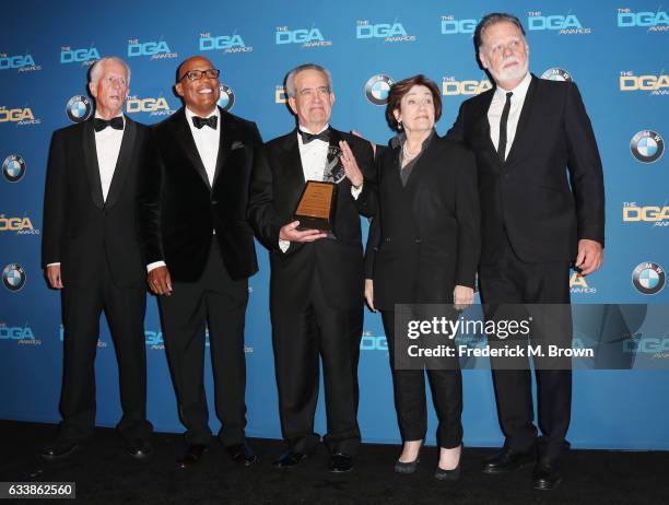 Retiring DGA National Executive Director Jay D. Roth , recipient of the DGA Presidents Award, poses with director Michael Apted, DGA President Paris...