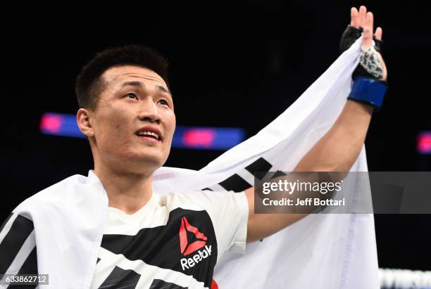 Chan Sung Jung of South Korea celebrates his victory over Dennis Bermudez in their featherweight bout during the UFC Fight Night event at the Toyota...