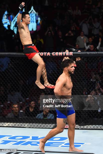 Chan Sung Jung of South Korea celebrates his victory over Dennis Bermudez in their featherweight bout during the UFC Fight Night event at the Toyota...