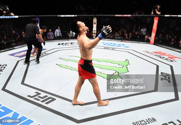 Chan Sung Jung of South Korea celebrates his victory over Dennis Bermudez in their featherweight bout during the UFC Fight Night event at the Toyota...