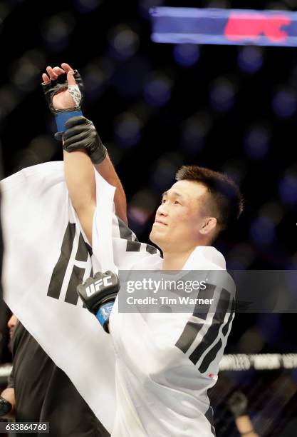 Chan Sung Jung of South Korea celebrates after defeating Dennis Bermudez in their featherweight bout during the UFC Fight Night event at the Toyota...