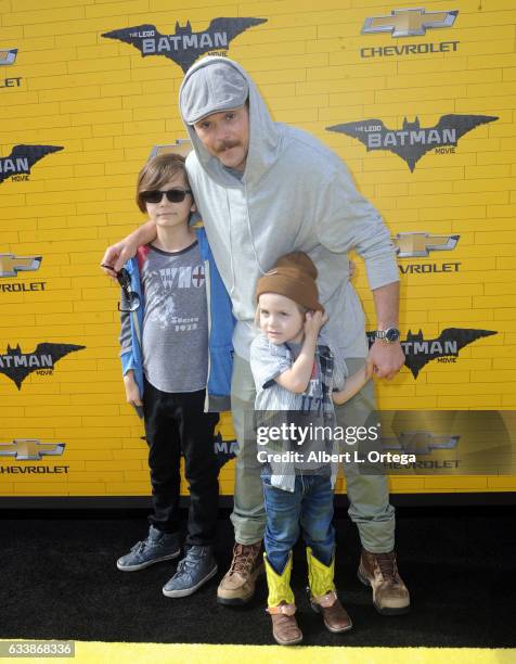 Actor Clayne Crawford and sons arrive for the Premiere Of Warner Bros. Pictures' "The LEGO Batman Movie" held at Regency Village Theatre on February...