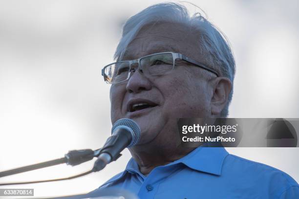 Former California congressman Mike Honda speaks to protesters of President Donald Trump's Muslim travel ban at San Francisco City Hall during a...