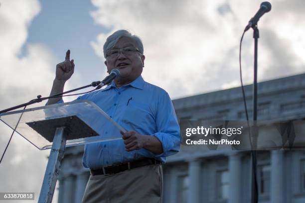 Former California congressman Mike Honda speaks to protesters of President Donald Trump's Muslim travel ban at San Francisco City Hall during a...