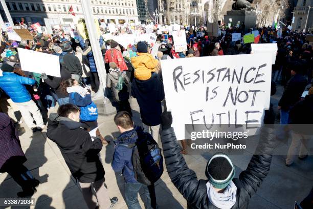Sign in the crowd as an estimated 5.000 protest the Donald Trump Presidency during the March for Humanity, in Philadelphia, PA, on February 4th, 2017.