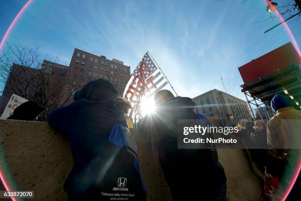 Protestors march on Market St. In Philadelphia, PA, on February 4th, 2017. In protest of the Donald Trump Presidency an estimated 5.000 participate...