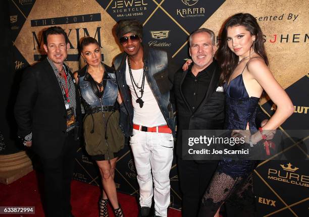 Of Karma International Dylan Marer, singer Fergie, rapper Nick Cannon, attorney Thomas J. Henry, and actress Maya Henry attend The MAXIM Super Bowl...