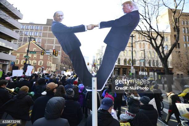 Protestors march on Market St. In Philadelphia, PA, on February 4th, 2017. In protest of the Donald Trump Presidency an estimated 5.000 participate...