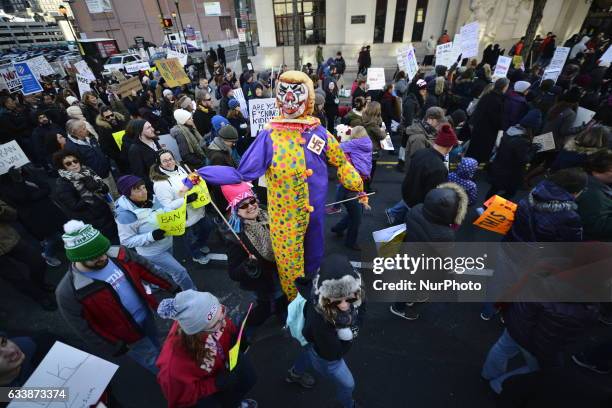 Protestors march on Market St. In Philadelphia, PA, on February 4th, 2017. In protest of the Donald Trump Presidency an estimated 5.000 participate...