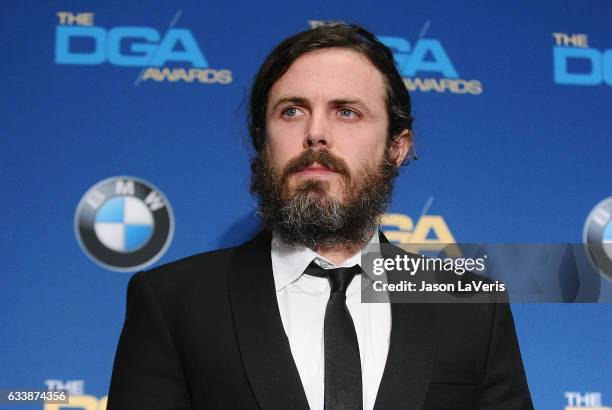 Actor Casey Affleck poses in the press room at the 69th annual Directors Guild of America Awards at The Beverly Hilton Hotel on February 4, 2017 in...