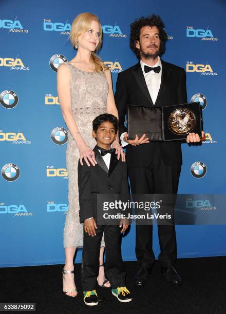 Actress Nicole Kidman, actor Sunny Pawar and director Garth Davis pose in the press room at the 69th annual Directors Guild of America Awards at The...