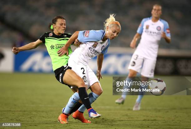 Hayley Raso of Canberra and Teigen Allen of Melbourne City compete for the ball during the W-League Semi Final match between Canberra United and...