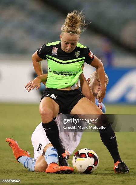 Hannah Brewer of Canberra is tackled by Teigen Allen of Melbourne City during the W-League Semi Final match between Canberra United and Melbourne...