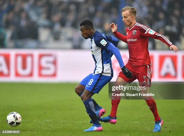 Salomon Kalou of Berlin is challenged by Florent Hadergjonaj of Ingolstadt during the Bundesliga match between Hertha BSC and FC Ingolstadt 04 at...