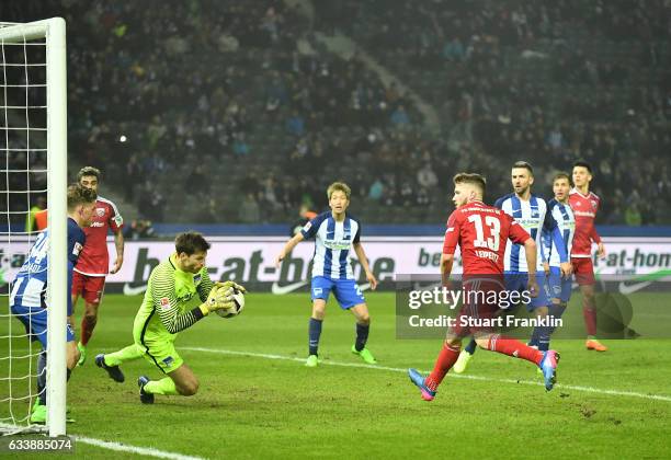Rune Jarstein of Berlin saves a shot from Robert Leipertz of Ingolstadt during the Bundesliga match between Hertha BSC and FC Ingolstadt 04 at...