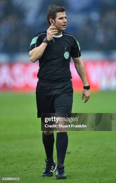 Referee Frank Willenborg looks on during the Bundesliga match between Hertha BSC and FC Ingolstadt 04 at Olympiastadion on February 4, 2017 in...