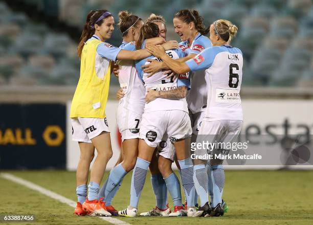 Jessica Fishlock of Melbourne City celebrates scoring a goal with team mates during the W-League Semi Final match between Canberra United and...