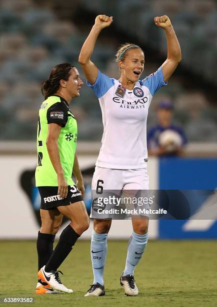 Aivi Luik of Melbourne City celebrates victory as Lisa De Vanna of Canberra looks dejected at the end of the W-League Semi Final match between...