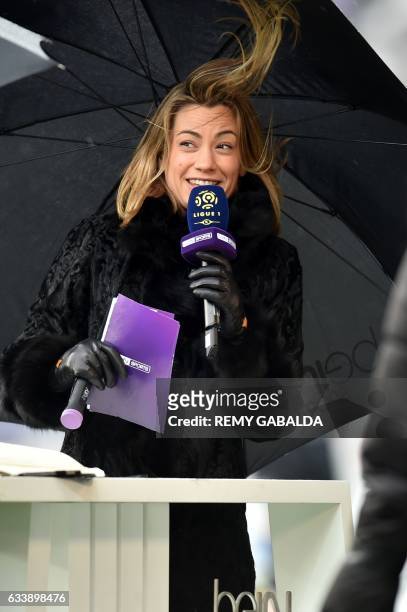 French journalist Anne-Laure Bonnet smiles prior to the the French L1 football match between Toulouse and Angers on february 5, 2017 at the Municipal...