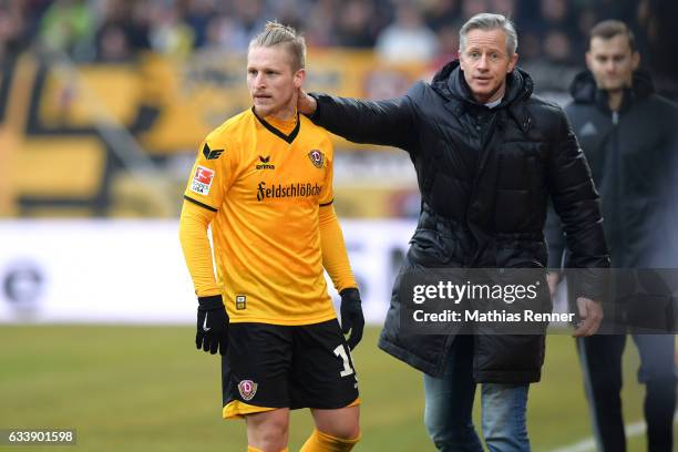 Marvin Stefaniak of SG Dynamo Dresden and coach Jens Keller of 1 FC Union Berlin of SG Dynamo Dresden during the game between SG Dynamo Dresden and...