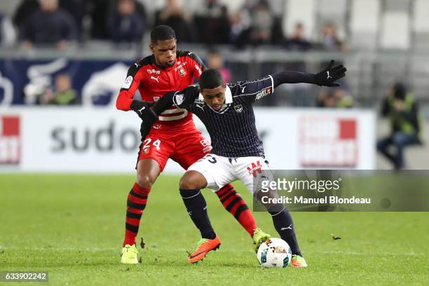 Malcom of Bordeaux and Ludovic Baal of Rennes during the Ligue 1 match between Girondins de Bordeaux and Stade Rennais Rennes at Nouveau Stade de...