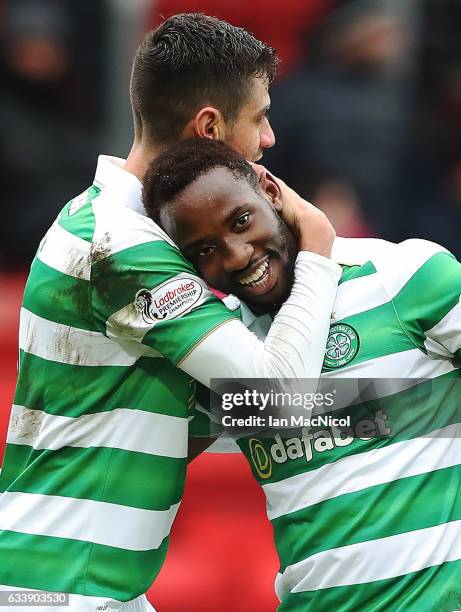 Moussa Dembele of Celtic is congratulated by Nir Bitton of Celtic after he scores his third goal during the Ladbrokes Scottish Premiership match...