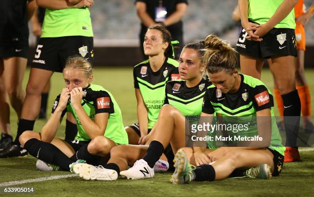 Canberra players look dejected after defeat in the W-League Semi Final match between Canberra United and Melbourne City FC at GIO Stadium on February...