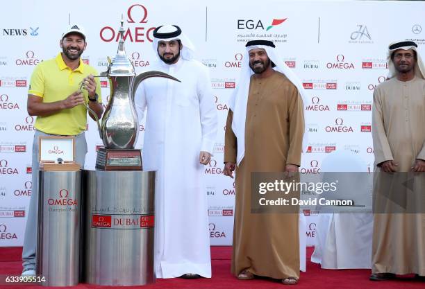 Sergio Garcia of Spain is presented with the trophy by His Highness Shaikh Ahmed Bin Mohammed Bin Rashid Al Maktoum the President of the UAE National...