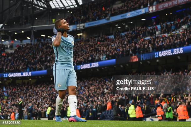 Manchester City's Brazilian striker Gabriel Jesus celebrates after scoring their late winning goal during the English Premier League football match...