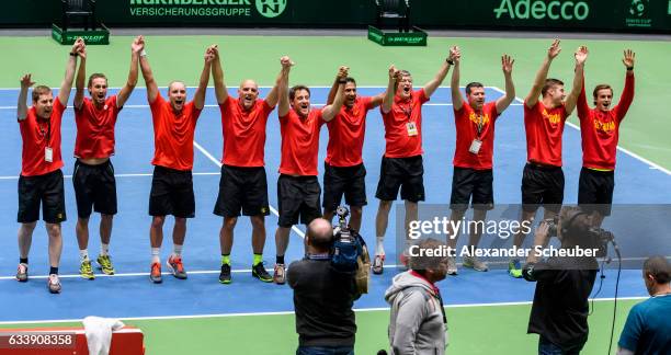 Steve Darcis of Belgium celebrates the victory with his teammates against Alexander Zverev of Germany during day three of the Davis Cup World Group...