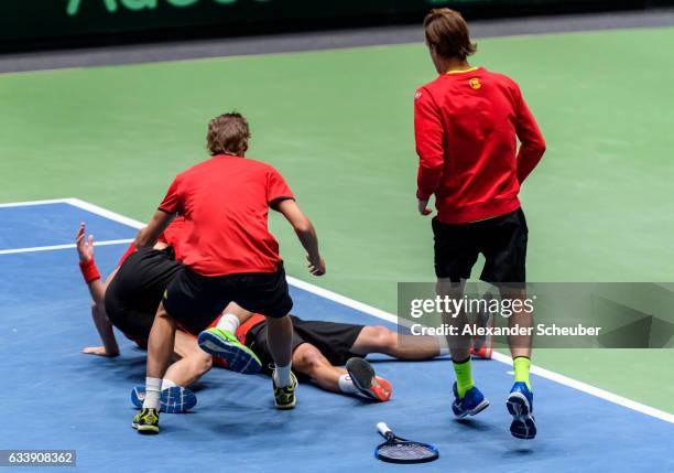 Steve Darcis of Belgium celebrates the victory with his teammates against Alexander Zverev of Germany during day three of the Davis Cup World Group...