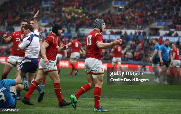 Jonathan Davies of Wales celebrates after scoring his team's first try during the RBS Six Nations match between Italy and Wales at the Stadio...