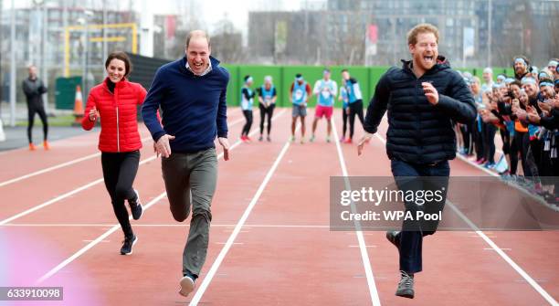 Catherine, Duchess of Cambridge, Prince William, Duke of Cambridge and Prince Harry race during a Marathon Training Day with Team Heads Together at...