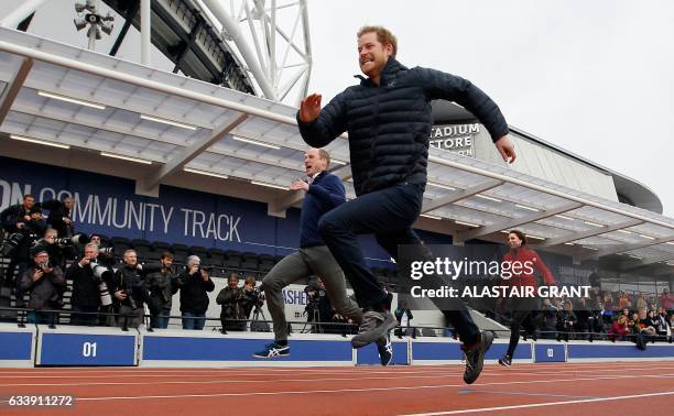 Britain's Catherine, Duchess of Cambridge , Britain's Prince William, Duke of Cambridge and Britain's Prince Harry take part in a relay race, during...