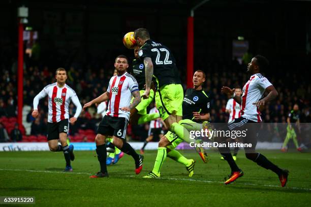 Shane Duffy of Brighton & Hove Albion scores his team's second goal during the Sky Bet Championship match between Brentford and Brighton & Hove...