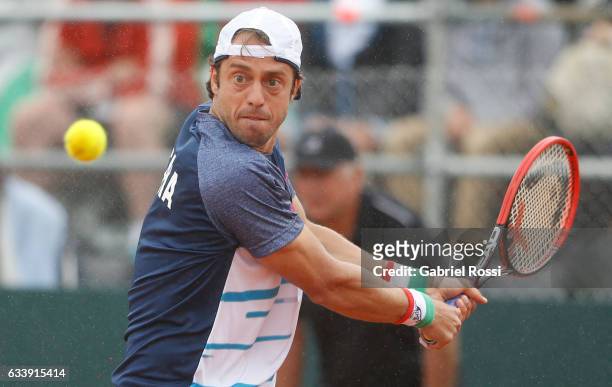 Paolo Lorenzi of Italy looks on the ball prior to take a backhand shot during a singles match between Carlos Berlocq and Paolo Lorenzi as part of day...