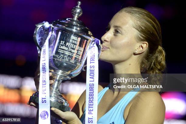 France's Kristina Mladenovic kisses her trophy after the final match of the WTA St. Petersburg Ladies Trophy 2017 tennis tournament against...