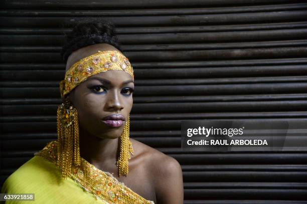 Colombian transvestite known as Maria Solima de Albaniz, representing the country of Somalia, poses before competing in the First Miss Universe Gay...