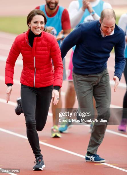 Catherine, Duchess of Cambridge and Prince William, Duke of Cambridge take part in a running race against Prince Harry as they join a Team Heads...